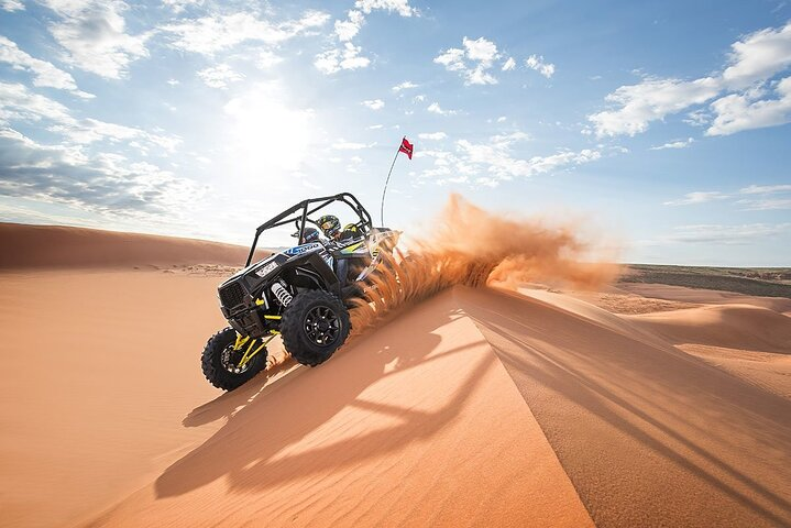 Experience the thrill of self-driving through Dubai's striking red desert conquering towering dunes and capturing unforgettable moments in a breathtaking landscape. Adventure awaits at every turn!